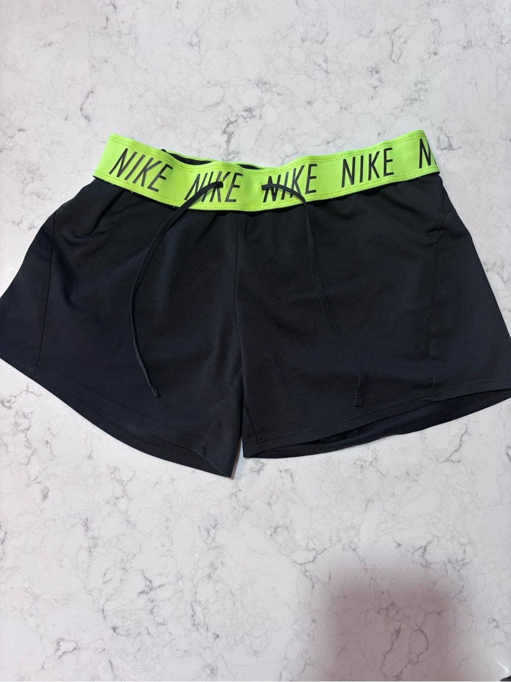 Nike Women’s Black Athletic Shorts with Neon Green Logo Waistband